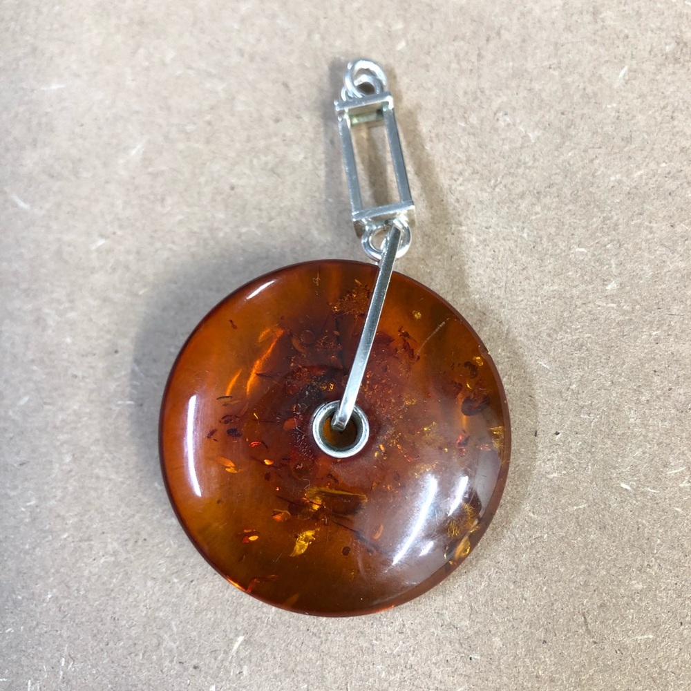 Vintage Sterling Silver  Torus Amber Pendant.
